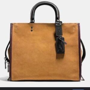COACH 1941 Rogue 30 tan suede and oxblood leather trim.